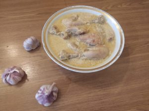 shkmeruli - main dish recipe made with meat in white cream garlic sauce